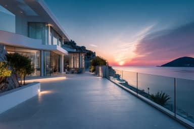 FS 1500 rahmenlose Glasbalustrade auf Küstenvilla bei Sonnenuntergang mit Meerblick