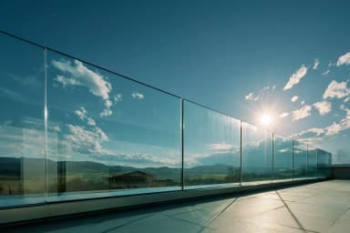 FS 3000 rahmenloses Glasgeländer auf Dachterrasse mit Bergpanorama — Aluminium-Bodenprofil, VSG-Sicherheitsglas